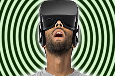 man with VR headset and black and green spiral wheel behind him