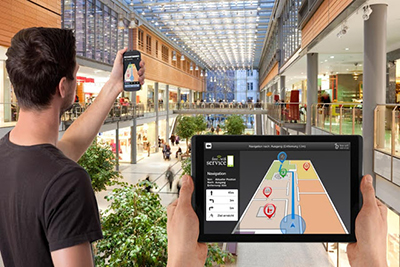 holding phone while viewing virtual map of the mall